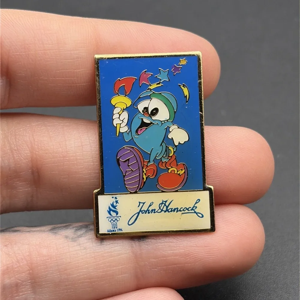 1996 Atlanta Olympics Izzy Mascot John Hancock Sponsor Lapel Hat Pin‎